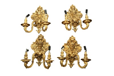 Lot 535 - A SET OF FOUR FRENCH TASTE GILT BRONZE TWO LIGHT WALL LIGHTS, 20TH CENTURY