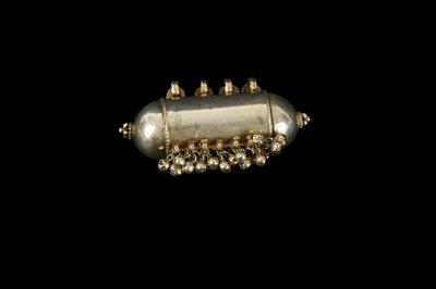 Lot 26 - A 19TH CENTURY NORTH AFRICAN SILVER PRAYER SCROLL AMULET