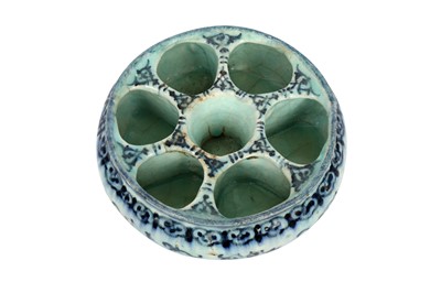 Lot 287 - A TIMURID-STYLE BLUE AND WHITE POTTERY FLOWER VESSEL