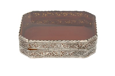 Lot 361 - AN INDO-PORTUGUESE AMBER GLASS AND SILVER FILIGREE BOX