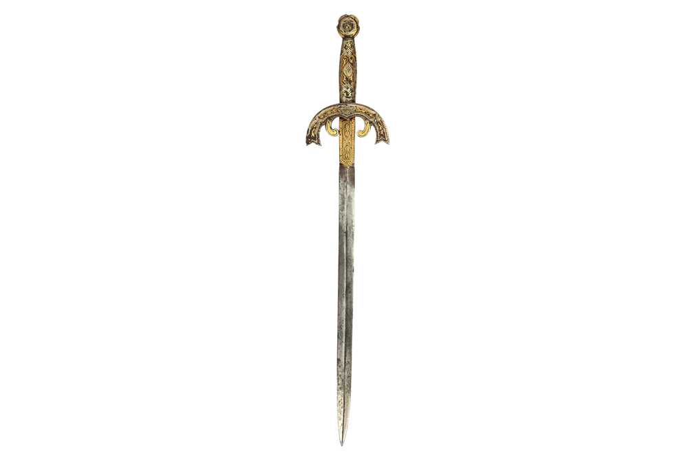 Lot 349 - A GOLD AND SILVER-DAMASCENED TOLEDO WARE LETTER OPENER