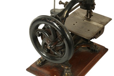 Lot 241 - HABERDASHERY: AN ENGLISH TABLE MOUNTED SEWING MACHINE BY THE ROYAL SEWING MACHINE COMPANY LIMITED