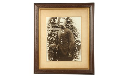 Lot 224 - COLLECTABLES: A FRAMED BLACK AND WHITE PORTRAIT OF A POLICE OFFICER