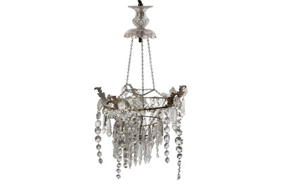 Lot 1124 - A THREE TIER CUT GLASS CHANDELIER, EARLY 20TH CENTURY