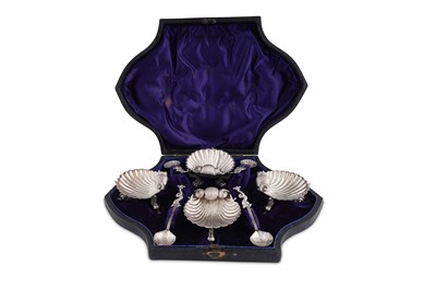 Lot 590 - A CASED SET OF FOUR VICTORIAN STERLING SILVER SALTS AND SPOONS, BIRMINGHAM 1880 BY HILLIARD AND THOMPSON