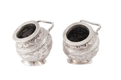Lot 611 - A PAIR OF EARLY 20TH CENTURY ANGLO - INDIAN UNMAKRED SILVER SALTS, CUTCH CIRCA 1910