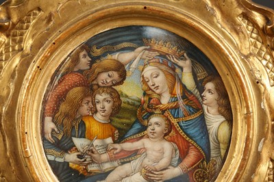 Lot 31 - A 19TH CENTURY PAINTED IVORY PANEL DEPICTING THE MADONNA OF THE MAGNIFICAT, AFTER BOTTICELLI