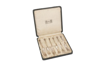Lot 497 - A cased set of George V ‘Arts and Crafs’ sterling silver cake forks, Birmingham 1930 by Liberty and Co