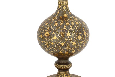 Lot 303 - A QAJAR GOLD-DAMASCENED STEEL BOTTLE WITH GRAPES