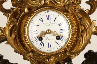 Lot 75 - A FINE NAPOLEON III GILT AND PATINATED BRONZE CANDELABRA CLOCK BY JULES GRAUX, PARIS, CIRCA 1860