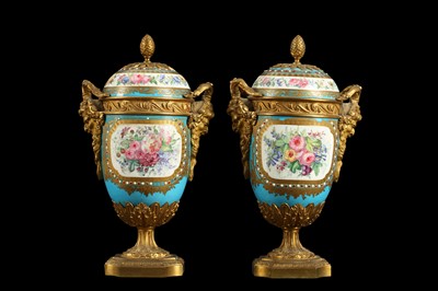 Lot 52 - A PAIR OF 19TH CENTURY FRENCH SEVRES STYLE PORCELAIN AND ORMOLU MOUNTED URNS AND COVERS