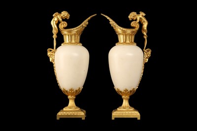 Lot 57 - A FINE PAIR OF 19TH CENTURY FRENCH CARRARA MARBLE AND ORMOLU EWERS