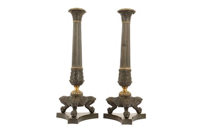 Lot 71 - A LARGE PAIR OF EARLY 19TH CENTURY REGENCY BRONZE AND PARCEL GILT CANDLESTICKS