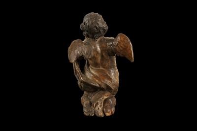 Lot 179 - AN EARLY 17TH CENTURY SOUTH GERMAN POLYCHROME DECORATED AND CARVED WOOD FIGURE OF A CHERUB