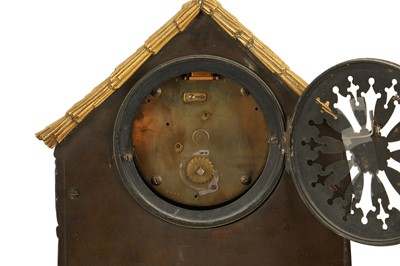 Lot 318 - AN EARLY 19TH CENTURY FRENCH EMPIRE PERIOD GILT AND PATINATED BRONZE FIGURAL MANTEL CLOCK
