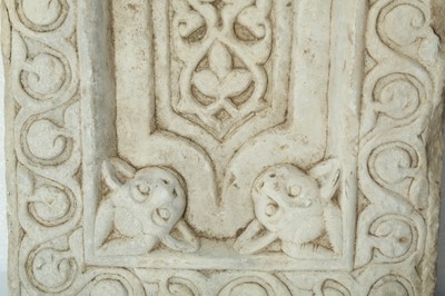 Lot 263 - A CARVED WHITE MARBLE RELIEF WITH HORNED DEVILS