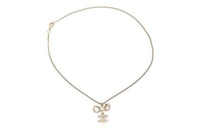 Lot 312 - Chanel Gold CC Logo Crystal Bow Necklace