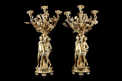 Lot 79 - A LARGE PAIR OF 19TH CENTURY FRENCH GILT BRONZE FIGURAL CANDELABRA