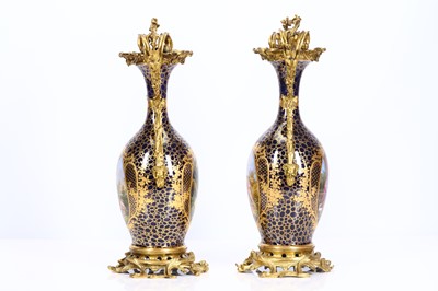 Lot 63 - JOSEPH RENE BINET (FRENCH, 1866-1911): A VERY FINE PAIR OF LATE 19TH CENTURY SEVRES STYLE PORCELAIN URNS