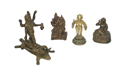 Lot 372 - A GROUP OF NINE BRONZE DEVOTIONAL MINIATURE ICONS (MURTI) AND SEVEN INDIAN BRONZE RITUAL VESSELS