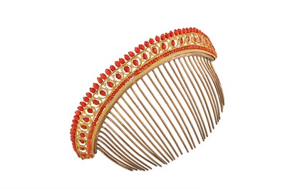Lot 196 - λ  An early 19th century coral and gilt metal hair comb