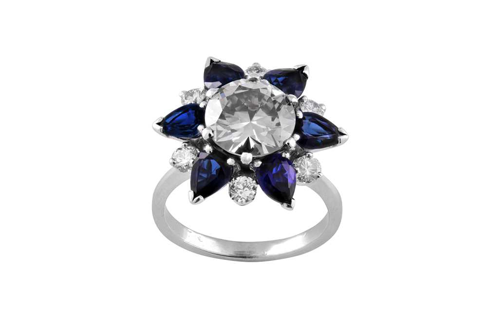 Lot 71 - A sapphire and diamond dress ring