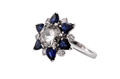 Lot 71 - A sapphire and diamond dress ring
