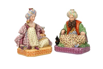 Lot 355 - A PAIR OF JACOB PETIT PORCELAIN FIGURAL FLASKS OF A SEATED SULTAN AND SULTANA
