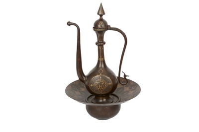 Lot 290 - A GOLD-DAMASCENED STEEL EWER AND BASIN