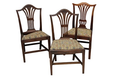 Lot 166 - A HARLEQUIN SET OF THREE GEORGE III HEPPLEWHITE STYLE DINING CHAIRS
