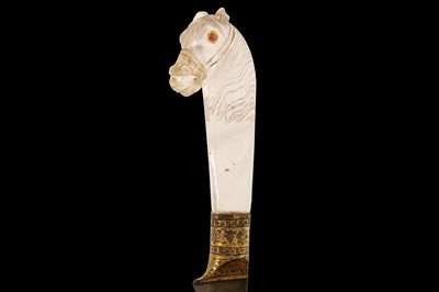 Lot 28 - AN 18TH / 19TH CENTURY NORTH INDIAN MUGHAL ROCK CRYSTAL HORSE HEAD DAGGER (PESHKABZ)
