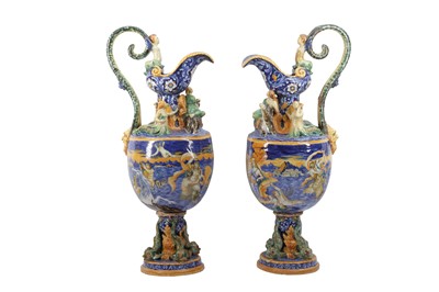 Lot 99 - A PAIR OF LARGE ITALIAN MAIOLICA EWERS, LATE 19TH/EARLY 20TH CENTURY