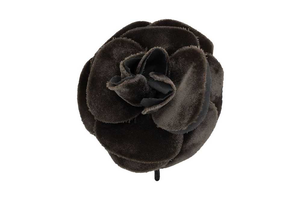 Sold at Auction: CHANEL WHITE LEATHER CAMELLIA BROOCH