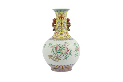 Lot 559 - A CHINESE FAMILLE ROSE 'FRUIT' VASE.