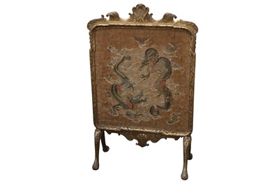 Lot 174 - A GEORGE I STYLE BAROQUE CARVED GILT PINE FIRE SCREEN, CIRCA 1900