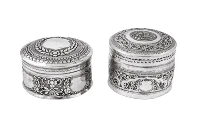 Lot 180 - Two mid- 20th century Burmese unmarked silver betel boxes or dressing table jars, circa 1950