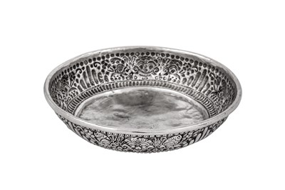 Lot 212 - An early to mid-20th century Balinese (Indonesian) unmarked silver flower offering bowl, circa 1940