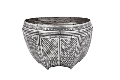 Lot 195 - An early 20th century Burmese unmarked silver bowl or food measure, possibly Shan States circa 1900