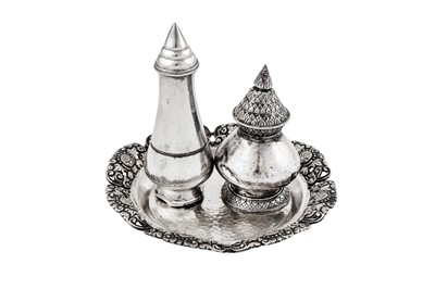 Lot 221 - A 18th/19th century Cambodian unmarked silver lime bottle