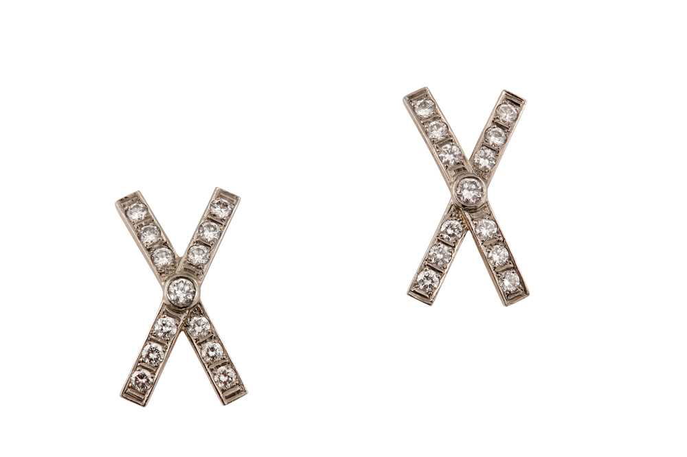 Lot 102 - A pair of diamond earrings