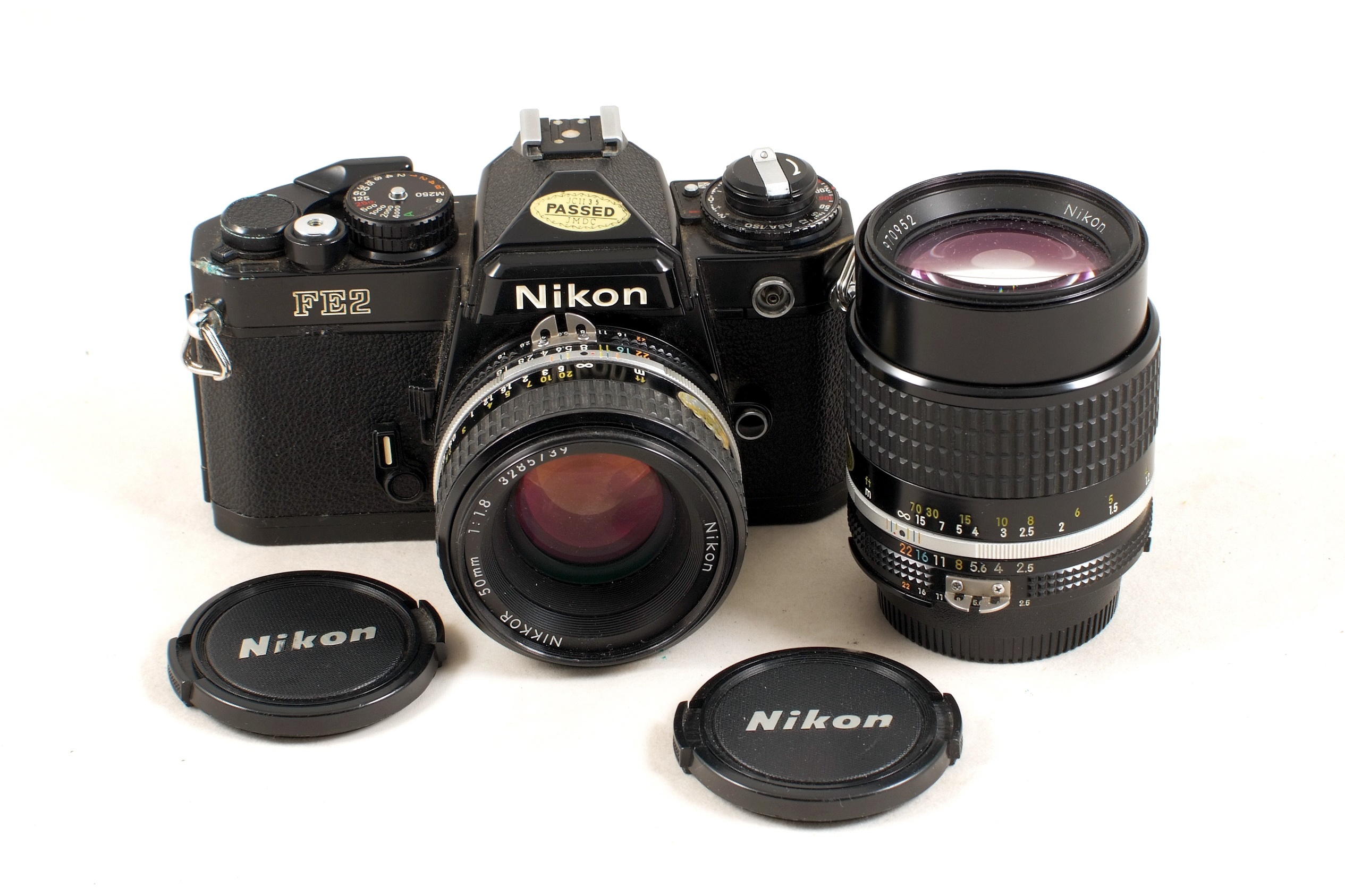 Lot 257 Black Nikon FE2 with 50mm & 105mm Lenses.
