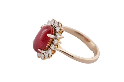 Lot 24 - A ruby and diamond cluster ring