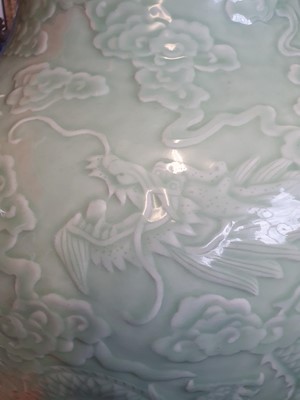 Lot 531 - A MASSIVE CHINESE CELADON-GLAZED 'DRAGON' VASE.