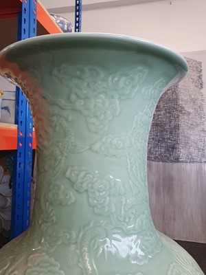 Lot 531 - A MASSIVE CHINESE CELADON-GLAZED 'DRAGON' VASE.