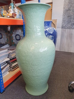 Lot 531 - A MASSIVE CHINESE CELADON-GLAZED 'DRAGON' VASE.