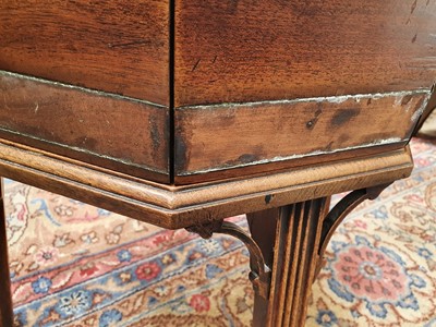 Lot 181 - A GEORGE III MAHOGANY OCTAGONAL BRASS BOUND WINE COOLER