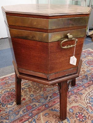 Lot 181 - A GEORGE III MAHOGANY OCTAGONAL BRASS BOUND WINE COOLER