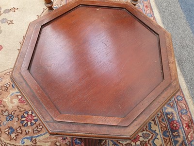 Lot 181 - A GEORGE III MAHOGANY OCTAGONAL BRASS BOUND WINE COOLER