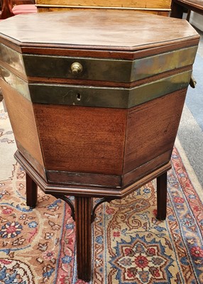 Lot 181 - A GEORGE III MAHOGANY OCTAGONAL BRASS BOUND WINE COOLER