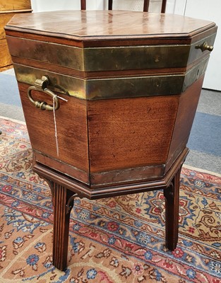 Lot 181 - A GEORGE III MAHOGANY OCTAGONAL BRASS BOUND WINE COOLER